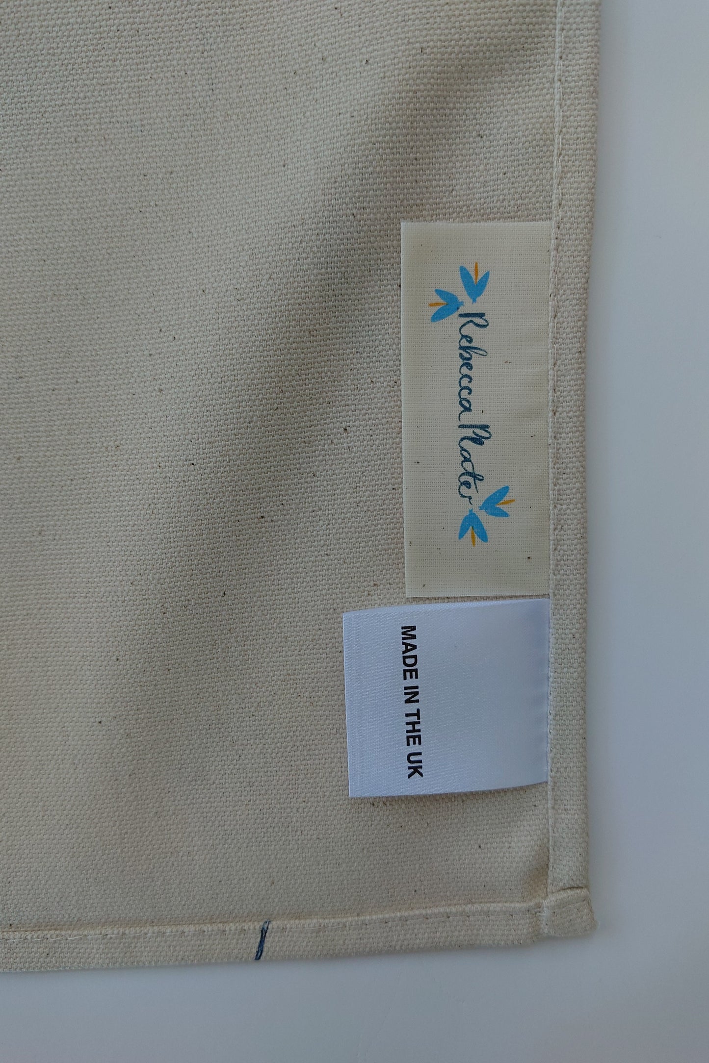 Organic Tea Towel - Machair Clock Red